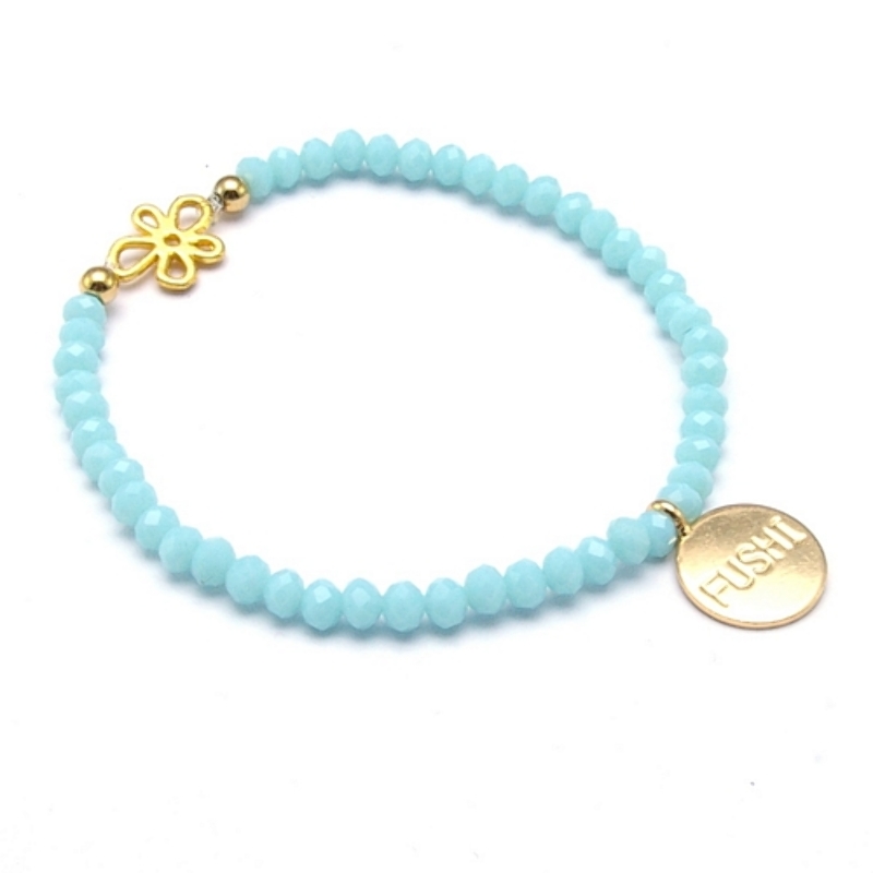 Armband lichtblauw facet met verguld bloemetje