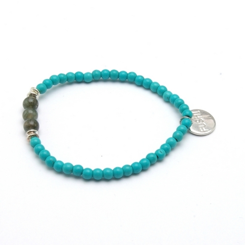 Armband 4mm gekleurd turquoise met steenkralen