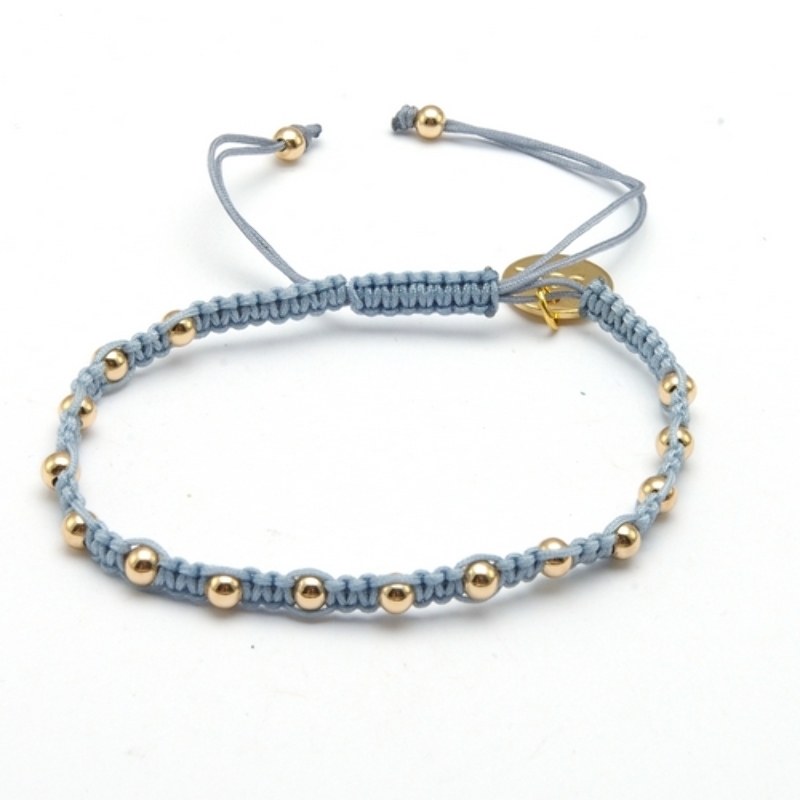 Armband macramee met verzilverden balletjes