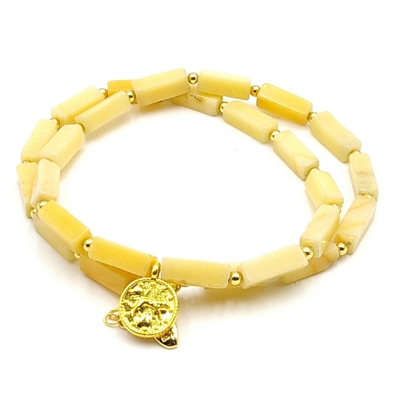 Ketting kort halfedelsteen (oker)geel met bedel muntje
