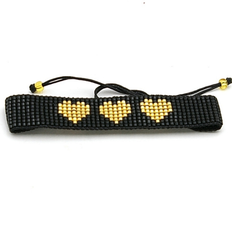 Armband plat geweven mijuki kraaltjes zwart met gouden hartjes