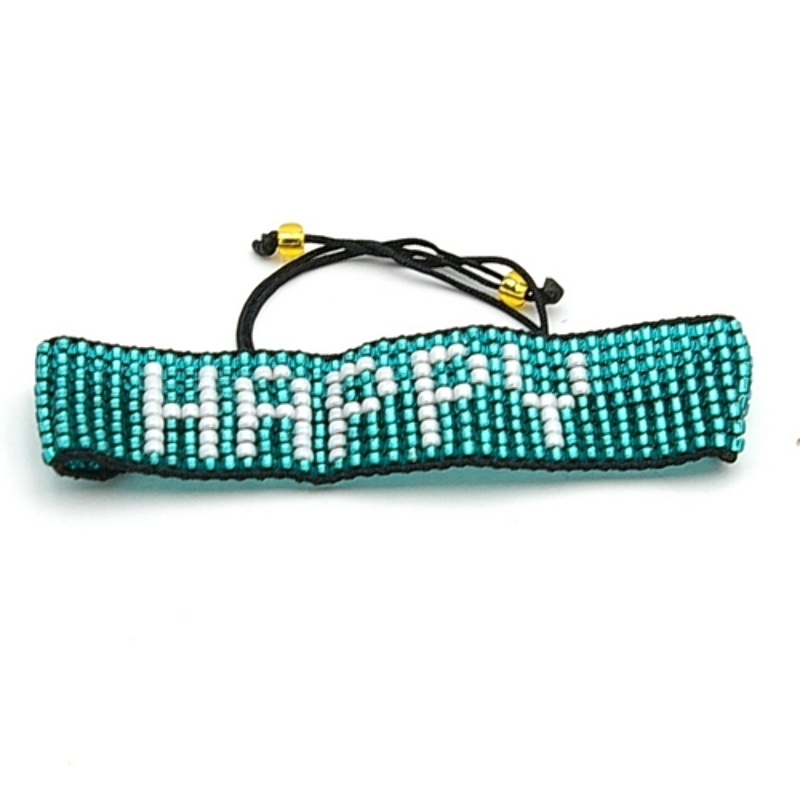 Armband plat geweven mijuki kraaltjes turquoise met witte letters