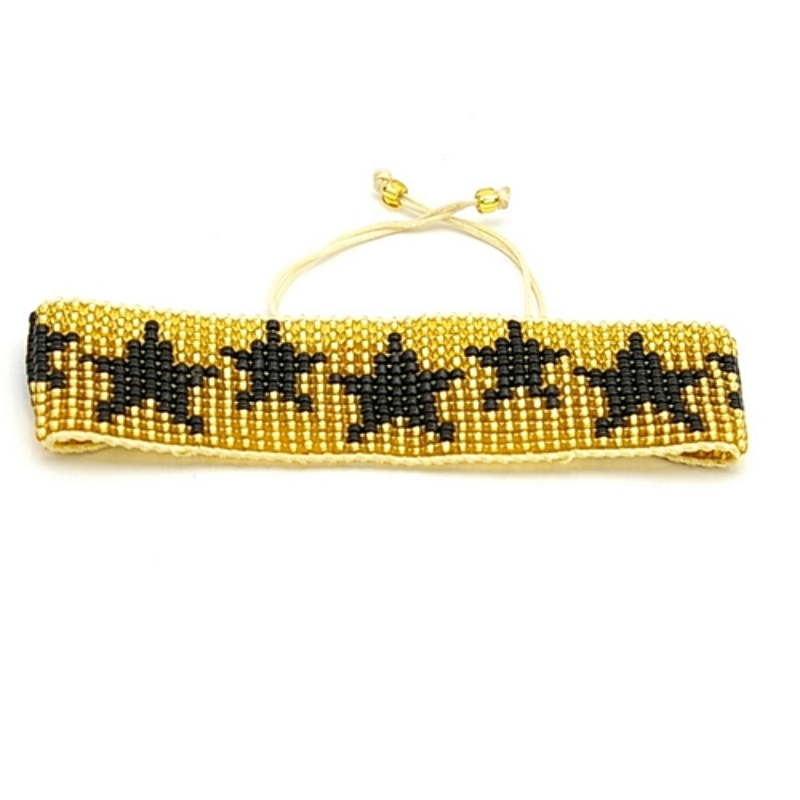 Armband plat geweven mijuki kraaltjes goud met zwarte sterren